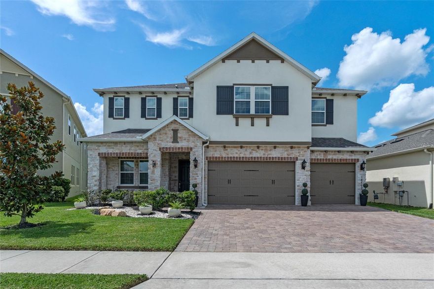 Fully Furnished for Rent for an extra $500 a month. Welcome to the gated community of Bradford Creek in Winter Garden. This luxurious home has 5 bedrooms, 4 bathrooms and a 3-car garage. The kitchen features an over extended island, walk in pantry, 5-burner gas cooktop, top of the line appliances. Enjoy the oversized covered patio with friends and family. Great for entertaining. There are two ensuite bedrooms, one downstairs, and one upstairs, perfect for mother-in-law and/or guests. The downstairs ensuite is hidden behind a custom built secrete door with its private access to the backyard. The master bedroom is huge with 2 walk-in closets and a bathroom features dual rain shower heads. This home is top of the line with all modern accessories like Cat 6 Ethernet, tankless gas water heater, ring camera at front door and smart lights and much more. Come see for yourself.