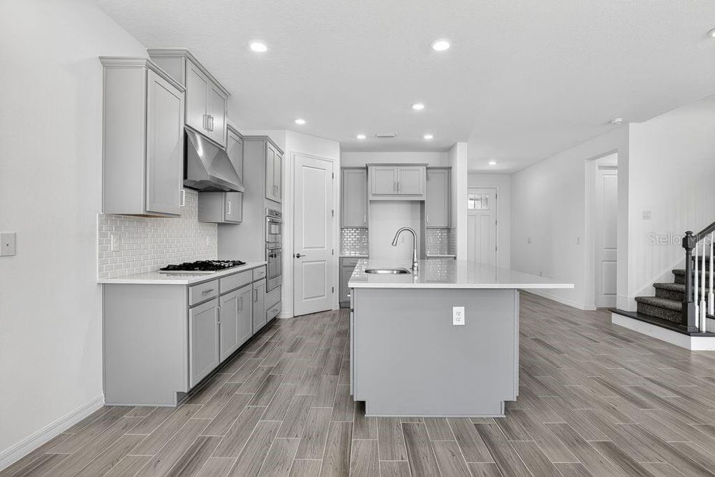 Photo of 831 Junonia Boulevard, New Smyrna Beach, FL 32168 (MLS # O6366133)