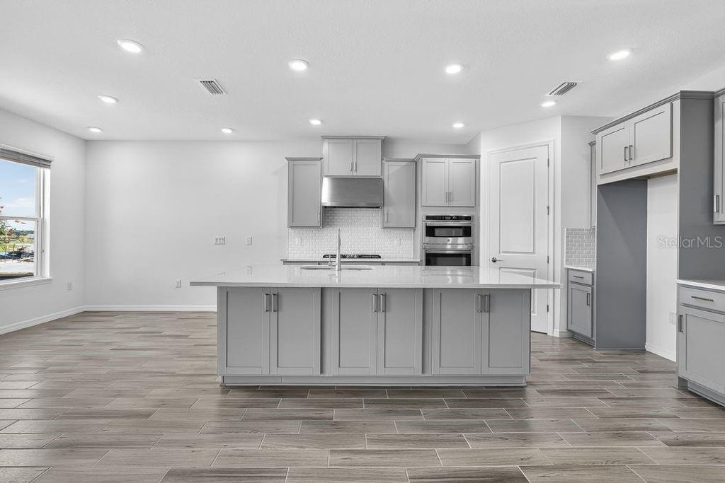 Photo of 831 Junonia Boulevard, New Smyrna Beach, FL 32168 (MLS # O6366133)