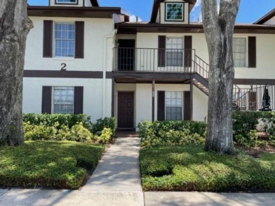 One or more photo(s) has been virtually staged. 2 Bedrooms / 2 Bath Condo located  on 2nd floor in Tuscawillow.  Move in condition.   Eat-in Kitchen, tiled floor, pantry, includes all appliances, washer, dryer, pass thru to dining area.  Spacious great room/dining area, glass slider opens to screen porch, private rear yard.  Master Bedroom has glass slider opening to screen porch, walk -in shower, dressing area.  Split Bedroom plan has newer carpet, tub in 2nd bathroom.. Gated community and pool.  Walking distance to park includes ball park, tennis courts, basketball, splash pool, lake, covered picnic areas and great Seminole County schools.  Community offers Golf Course and Country Club.