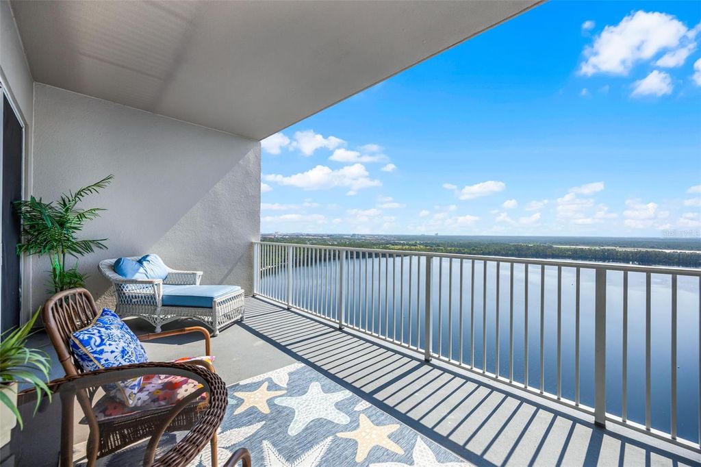 Photo of 13427 Blue Heron Beach Drive #2003, Orlando, FL 32821 (MLS # O6409669)