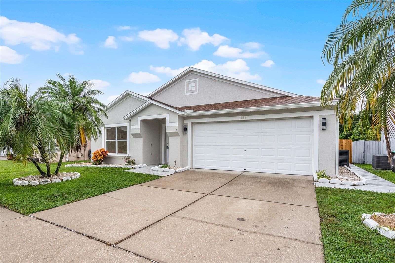 Welcome to 3156 Natoma Way, Orlando, FL 32825—an exceptional, fully renovated home located in one of Central Florida’s most desirable communities near UCF and surrounded by top A-rated schools including Arbor Ridge K-8, Legacy Middle School, and University High School. This move-in-ready property is perfect for families and entertainers alike, offering over 1,900 square feet of open-concept living space on an oversized lot just shy of a quarter acre, complete with a beautifully resurfaced private pool featuring new tile, a new system, and a brand-new pump. This home has been thoughtfully upgraded from the ground up, showcasing remarkable attention to detail throughout. The A/C unit was installed in 2025, the roof was replaced in 2017, and the water heater is from 2021. Inside, you’ll find luxury vinyl flooring, two spacious living areas, and a fully renovated kitchen designed for both chefs and entertainers. The kitchen features granite countertops, brand-new cabinetry, floating shelves, modern light fixtures, a coffee bar, stainless steel appliances, ample pantry space, and an open layout perfect for gatherings. Each bedroom is equipped with brand-new LED ceiling fans with remotes, and both bathrooms have been completely renovated with quartz countertops, sleek finishes, and custom tilework. The primary suite offers a true retreat with a walk-in closet, dual vanity, a luxurious jetted soaking tub with clear glass, and a frameless glass shower featuring modern tile design. Additional highlights include a new privacy fence, epoxy-coated garage flooring, and a shed in the backyard offering extra storage space—perfect for tools, lawn equipment, or seasonal items. This home truly stands out as a rare gem in the market, combining thoughtful renovations, modern design, and everyday functionality with NO REAR NEIGHBORS!!. Located minutes from UCF, Waterford Lakes Town Center, 408 and 417, and surrounded by parks, top schools, shopping, dining, and entertainment, this is a unique opportunity that’s priced to sell. With so many upgrades and such a desirable location, this one won’t last—schedule your private showing today!