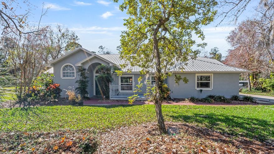 MOTIVATED SELLER and they will CONTRIBUTE 10K IN CLOSING COSTS WITH AN ACCEPTABLE OFFER!!  OVER 100K PRICE IMPROVEMENT!! Nestled in the serene community of Pickett Downs, this BEAUTIFUL 4-bedroom, 2-bath SPLIT plan, SCREENED POOL home offers the perfect combination of privacy and comfort. Situated on just over 2 acres with no rear neighbors, you’ll enjoy peaceful surroundings and ample space to spread out and take advantage of the PRIVATE access to PRISTINE Lake Pickett, a SKIABLE lake perfect for water sports. The home features a METAL roof (installed in 2017), ensuring durability and long-term protection. NEW AC was installed in 2023, and the water heater is NEW as well, providing peace of mind with modern, efficient systems. NEW WINDOWS in 2019, pool pump is only 3 years old too. Inside, the home has been freshly painted, both inside and out, and boasts UPDATED kitchens and baths for a contemporary feel. Engineered hardwood flooring and plantation shutters add to the updates! While additional storage space is available in the form of a versatile WORKSHOP. Perfect for a hobbyist or anyone needing extra room for tools and equipment. This horse friendly subdivision allows for 1 horse per acre with a bridal path in the neighborhood.  This home offers a perfect blend of convenience, privacy, and access to the great outdoors. Seminole County Schools, 45 minutes to the beach and Kennedy Space Center. Bring all your toys and an offer today!!