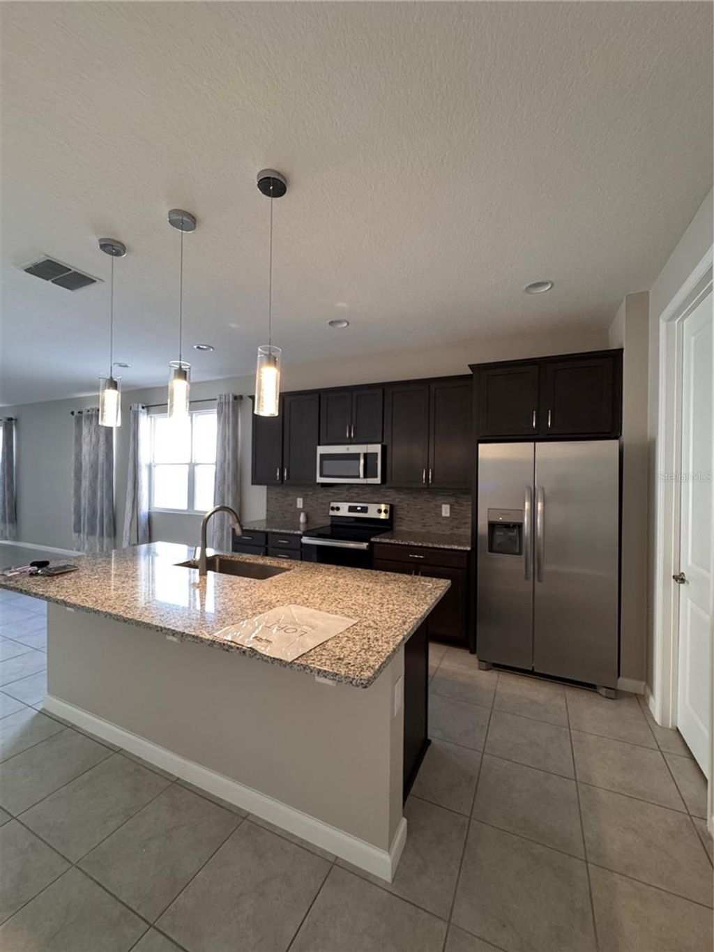 Photo of 541 Buchannan Drive, Davenport, FL 33837 (MLS # S5144343)