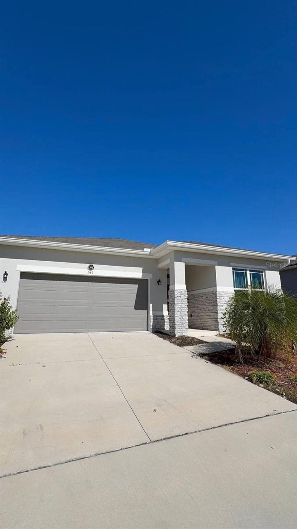 Photo of 541 Buchannan Drive, Davenport, FL 33837 (MLS # S5144343)