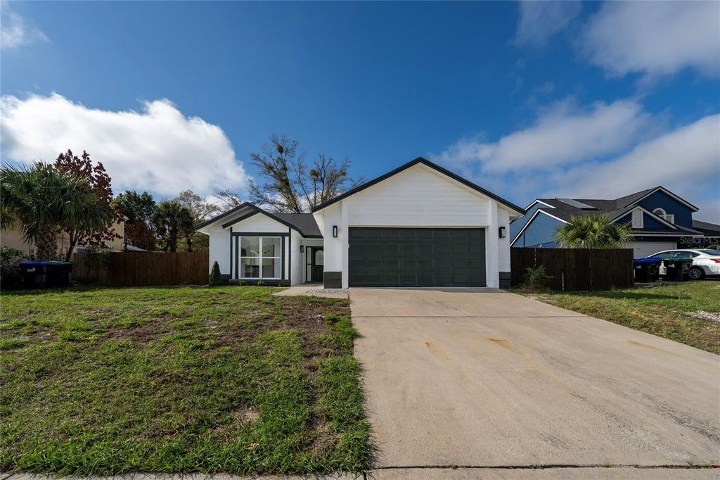 Photo of 5670 Breckenridge Circle, Orlando, FL 32818 (MLS # O6389334)