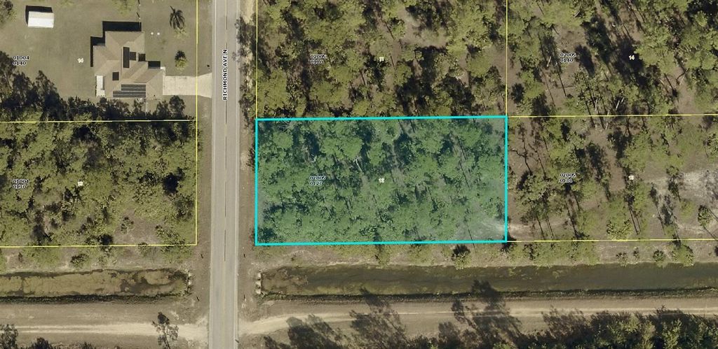 Photo of 1204 Richmond Avenue N, Lehigh Acres, FL 33972 (MLS # A4694157)