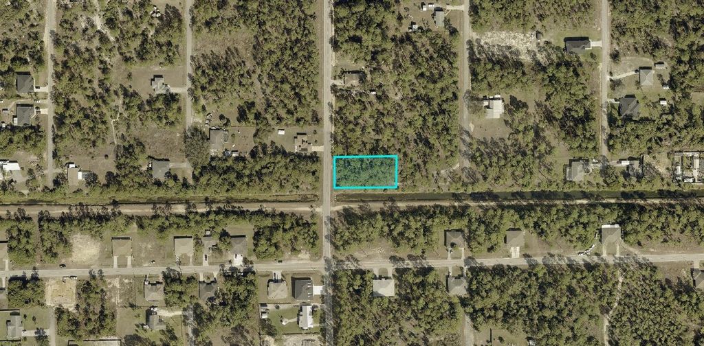 Photo of 1204 Richmond Avenue N, Lehigh Acres, FL 33972 (MLS # A4694157)
