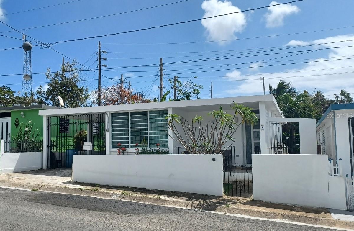 Welcome to Casita Sarita! This charming home has been updated, and is move in ready. A fantastic plus is the Generac solar system, that is grid tied, so you don’t even notice if the power goes out! Stepping through the front gate into a very tidy, well kept yard, you are greeted with a front porch perfect for relaxing and enjoying the neighborhood. Inside the floorplan is open, and you can see attention to detail in the remodeled kitchen with its concrete counters and island, complete with wood finish for a warm feel. This detail continues into the bathroom with lovely tile work and a bathtub!! There is an incredibly large walk in closet off of the primary bedroom, which could be kept as is, or turned into another bedroom. The the second bedroom has its own outside private entrance and very cool, rustic, outdoor bathroom and shower! This area could even be rented out for potential extra income. The room for the office could also be turned into a bedroom, giving the potential for four bedrooms. You have to see this! To top it off, the back deck is covered, and tastefully decorated for another outdoor area to entertain or simply enjoy. There is a green area behind the back deck that is an easement for the power company. This ensures your privacy and is planted with banana, and other lovely trees. A covered, enclosed carport allows for off street, secure parking, and a place for extra storage. This charming 2 bed, 2 bath home, with an office, is updated, turnkey, titled and ready to go! This approx. 1,200 sqft Turnkey Concrete 2 BR/2 BATH Single-Family Residential Property on approximately 1/10 of an acre is Titled and is zoned for Residential Use
The electric and plumbing have been updated. New windows and doors. The roof has been repaired and is sealed regularly. Here you are very close to Isabel Segunda where you have access to shops, restaurants, the ferry and beaches. Great location!