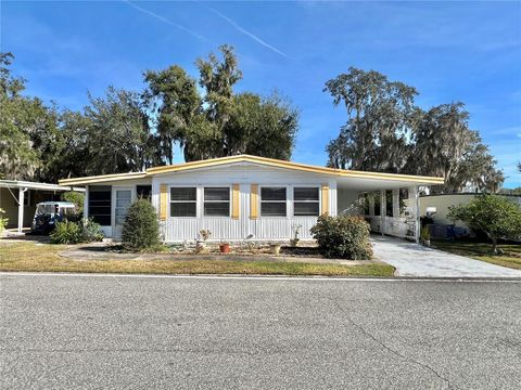 Photo of 101 Ixora Way, Leesburg, FL 34748 (MLS # G5104618)