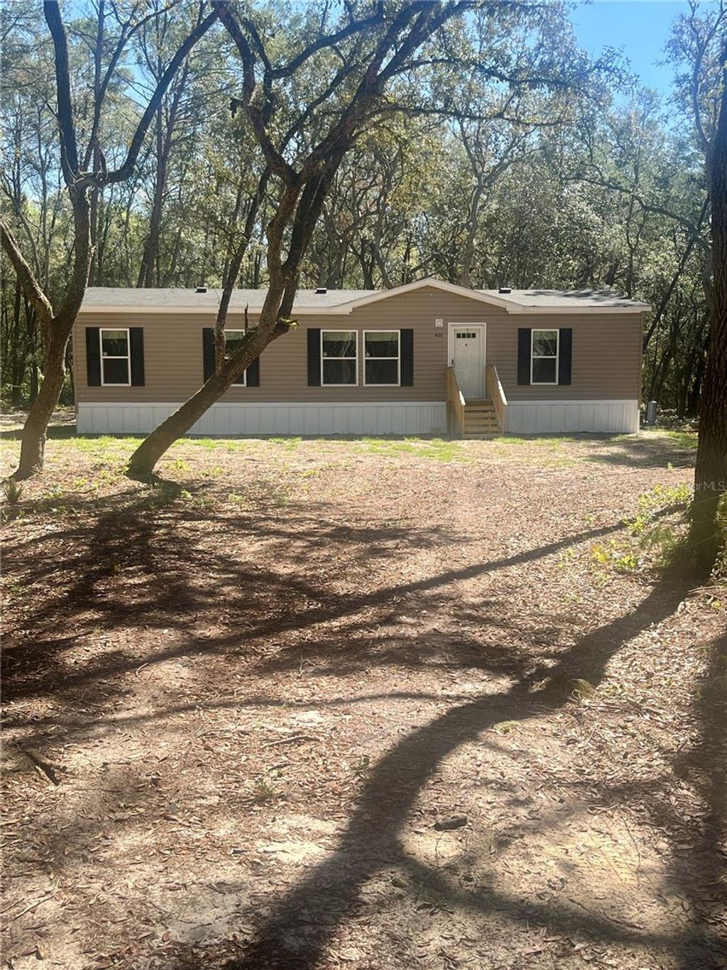 Photo of 400 S Holly Avenue, Florahome, FL 32140 (MLS # GC538696)