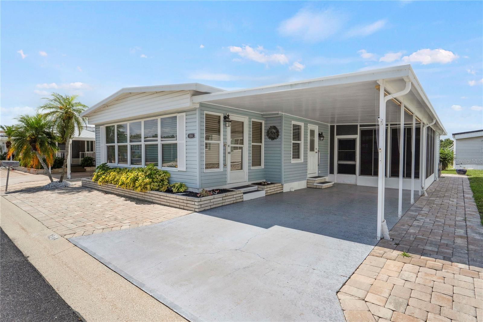 Welcome to this well-maintained 2-bedroom, 2-bathroom home with an inviting Florida room, inside laundry, and an enclosed lanai at the back of the carport, perfect for relaxing and entertaining. The home also features newer windows, and a spacious and bright living room with access to the kitchen and dining area. This home has been lovingly maintained. Seller is offering to pay at closing the rest of 2025 association fee for the new owner!
Located within the gated 90-acre Oakwood Manor community, you'll enjoy a low maintenance fee of $190 monthly and access to an array of amenities. The community's spacious Clubhouse is equipped with a full commercial kitchen, event stage, state-of-the-art fitness room, and more.
Outdoor recreation abounds, with an extra-large heated pool, kidney-shaped hot tub, and plenty of shaded areas for relaxation. You'll also find a putt-putt course, bocce ball, ping pong, horseshoes, and cornhole to enjoy.
Conveniently located near the Legacy Trail, 12 pickleball courts, and just a short drive to the crystal sand beaches of Lido and Siesta Key, downtown entertainment, and local attractions.
While pets and motorcycles aren't allowed, you'll feel right at home in this vibrant community where neighbors become like family
Ready to experience the warmth and charm of Oakwood Manor? Contact your trusted Realtor today to make this incredible opportunity a reality!