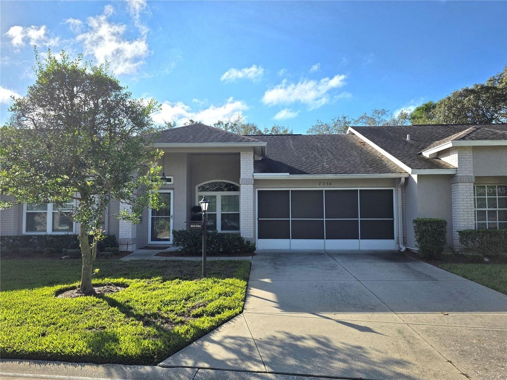 Photo of 7358 Woodhollow Road, Spring Hill, FL 34606 (MLS # W7889845)