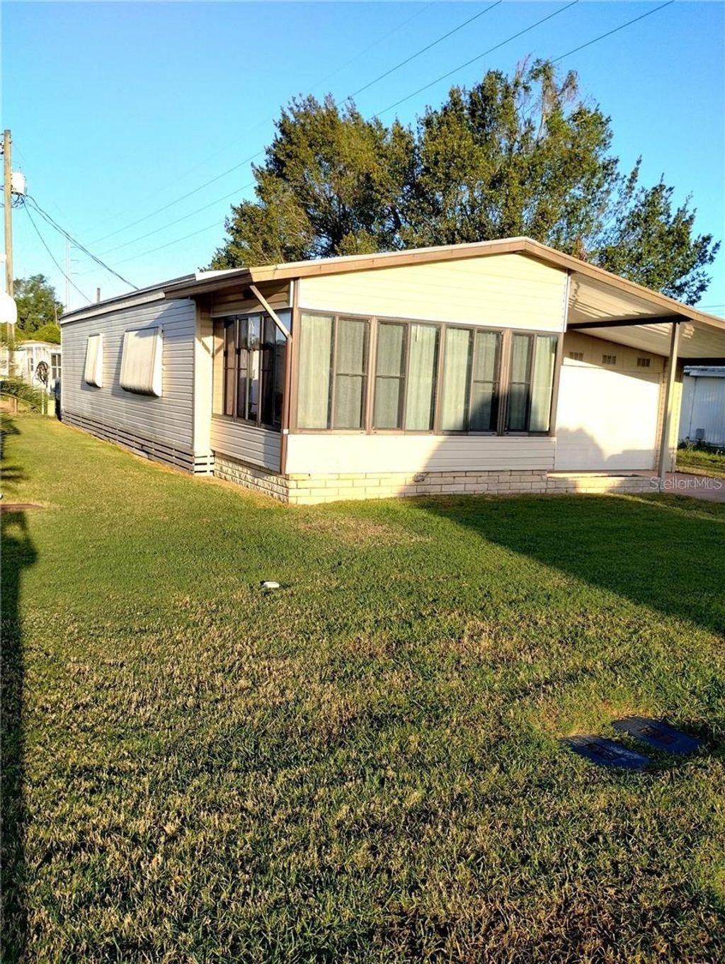 Photo of 6443 Midland Street, Zephyrhills, FL 33542 (MLS # TB8398070)