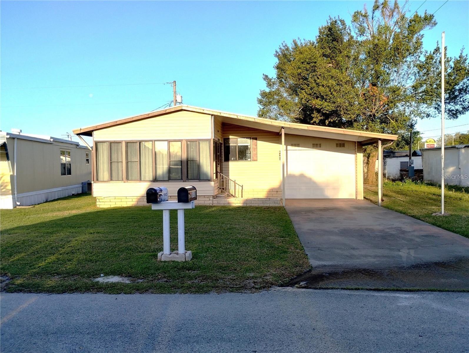 Unveil the lifestyle you've been dreaming of with this Spacious 2-bedroom, 2-bath, 1989 manufactured home in a lively 55+ community! Perfectly positioned less than a mile from grocery stores and restaurants, this home give the ultimate blend of convenience and charm. Step inside to a bright and inviting living area, a kitchen designed to inspire your inner chef, and cozy bedrooms that exude comfort and relaxation. The standout feature: A spacious garage with a small workshop - ideal for your car, hobbies, or creative projects. This community is buzzing with energy, packed with activities, and ready to fill your days with joy and connection. Don't just find a home - discover the exciting new chapter of your life here! (NEW 2024 Septic System and Survey is available.) Please DO NOT park on Front Lawn - septic is located in front.