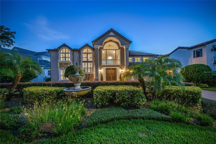 Stunning waterfront residence on Lake Minnehaha, part of the celebrated Winter Park Chain of Lakes! This spacious 5-bedroom, 4.5-bath home is designed for luxurious lakefront living and effortless entertaining. The gourmet kitchen is a chef’s dream, featuring a Thermador 6-burner gas range, GE Monogram side-by-side refrigerator and freezer, Bosch dishwasher, wine refrigerator, and a separate prep area with additional GE oven and dishwasher.
The expansive first-floor primary suite offers lake views, a spa-style bath with custom cabinetry, an oversized shower, and a dedicated shoe closet. An additional first-floor bedroom with a private ensuite bath is ideal for guests or in-laws. Upstairs, you’ll find three additional bedrooms, two full baths, and a private office with serene views.
Enjoy Florida living year-round with a resort-style outdoor space that includes a covered lanai, sparkling pool and spa, fire pit, and a covered boat dock. Bring your ski boat and jet skis — your backyard is a waterfront playground. Plantation shutters throughout add a classic touch to the interior.
Zoned for top-rated Dommerich Elementary, Maitland Middle, and Winter Park High. Rare opportunity to live on the water in one of Central Florida’s most sought-after communities!