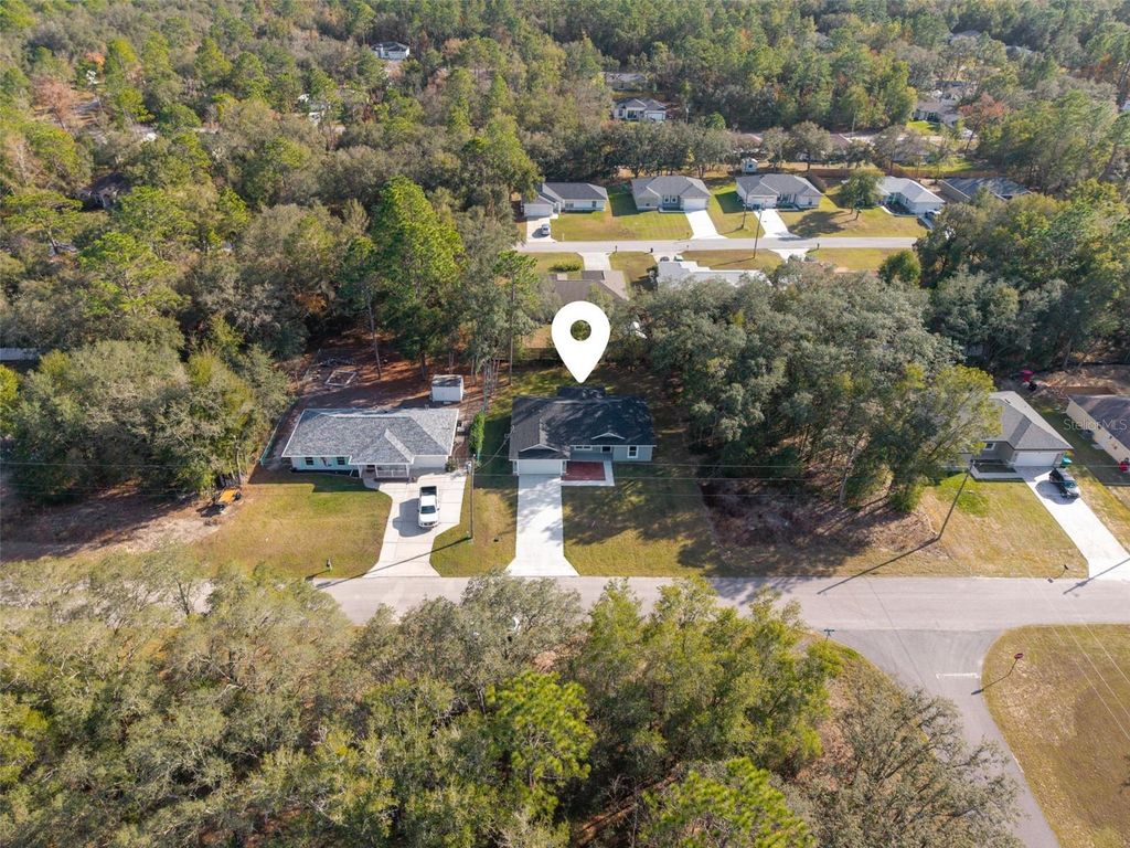 Photo of 274 W Bolero Place, Citrus Springs, FL 34434 (MLS # O6373111)