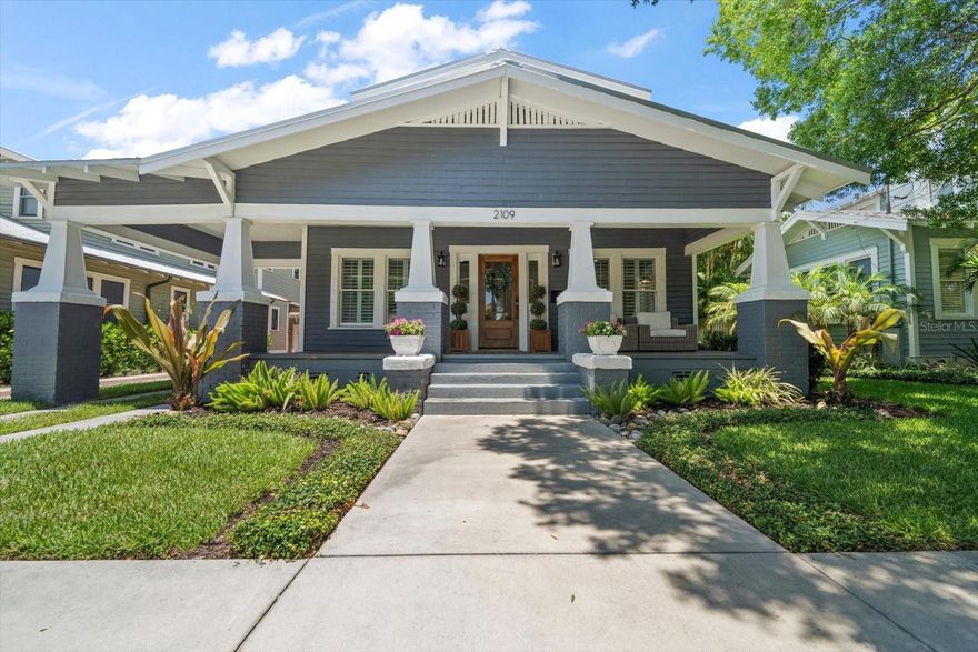 This stunning 5-bedroom, 3-bathroom, remodeled bungalow, complete with a detached garage apartment in historic Hyde Park harmoniously blends timeless charm and contemporary luxury, offering the ultimate South Tampa living experience near the iconic Bayshore Boulevard, SoHo District, and Hyde Park Village with downtown Tampa just minutes away.
As you walk up the inviting front porch and enter the home, you'll be greeted by a warm ambiance accentuated by abundant natural light streaming through the 50 double-pane, energy-efficient windows, illuminating the spacious layout. This home was reimagined in 2020 undergoing a large renovation with extensive detail and designer finishes throughout, showcasing its original 1921 architecture thoughtfully intertwined with modernity and opulence.
Step into culinary bliss in the kitchen, where style meets functionality seamlessly - featuring a large granite waterfall center island, complemented by a full pantry, wet bar, and top-of-the-line Viking appliances, including a 6-burner gas double oven stove, and a brushed nickel pot filler. The kitchen includes plenty of seating at the oversized island along with an eat-in area, with the formal dining room adjacent to the kitchen through the butler’s pantry. For more formal affairs, the dining room exudes elegance with its stunning lighting finishes and ample space for a large dining table. The kitchen flows into the family room which offers a large, cozy living space and a tranquil atmosphere with French doors leading to the backyard.
Retreat upstairs to find four more generously sized bedrooms, including the luxurious primary suite, complete with a lavishly appointed bathroom featuring designer wall tiles, marble floors, a luxurious soaking tub, and a separate walk-in shower as well as a generously sized master closet with custom buildouts. The three additional upstairs bedrooms share a large bathroom with dual vanities and a tub/shower combination. The laundry room is also conveniently located upstairs near the bedrooms. 
Lush greenery surrounds the newly landscaped backyard, creating your own slice of paradise, ideal for summer barbecues, unwinding under the stars, or soaking up the Florida sun. Situated out back is a detached one-car garage with a 432-square-foot garage apartment above it, equipped with a bath and kitchenette offering privacy and the perfect sanctuary for guests and visitors.
Located in the A-rated Mitchell-Wilson-Plant school district and within flood zone X- no flood insurance required! Schedule your private showing and make this home yours, today. | The main house is 3,706 sq ft with 5 bedrooms and 3 bathrooms, garage apartment is 432 sq ft and includes a bedroom, kitchenette, and full bathroom. In total there are 6 bedrooms and 4 full bathrooms on this property.