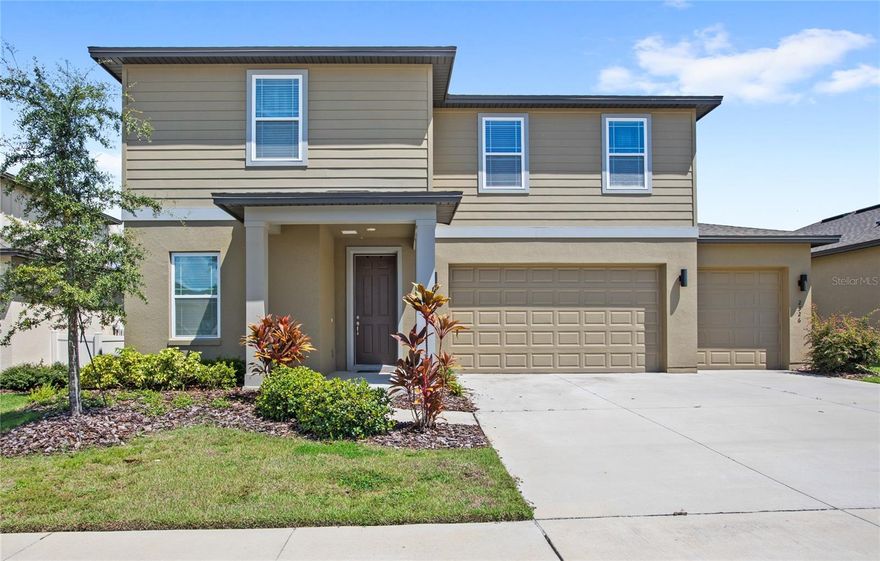 Why wait to build when you can move right into this like-new Ashton Woods home? Built in 2022, this 
stunning Teton model checks all the boxes: 5 bedrooms, 3 bathrooms, a versatile den, and a 3-car 
garage—all across 2,700+ square feet of stylish living space. 
The main level was made for entertaining with soaring 9’4” ceilings, wide-open living areas, and luxury 
vinyl plank flooring throughout. Love to cook? The upgraded kitchen shines with 42” cabinets topped 
with crown molding, quartz counters, Whirlpool appliances, and a sleek backsplash. There’s even a 
casual dining nook that overlooks your oversized backyard—perfect for a pool or just soaking in those 
unobstructed hillside views. A downstairs bedroom and full bath make a great setup for guests or multi-
gen living. 
Upstairs, the spacious loft is the ultimate media room, gaming zone, or kid hangout. The primary suite 
feels like a retreat with a spa-worthy bathroom featuring a frameless glass shower, floor-to-ceiling 
herringbone tile, quartz counters, and upgraded Moen fixtures. 
This home sits on one of the BEST lots in the neighborhood and gives you access to community 
playgrounds plus a highly anticipated pool coming soon. You’ll also love the location—close to the brand-
new Advent Health hospital, Minneola Horizon Academy K–8, and exciting new developments like the 
upcoming Crooked Can facility and Minneola city center – a 126-acre mixed use development. 
Commuting is a breeze with the new Turnpike interchange nearby, putting you less than 20 minutes from 
historic Downtown Winter Garden and just 35 minutes from Disney. 
Modern upgrades, room to grow, and a location that’s only getting better—this is the Minneola home 
you’ve been waiting for!