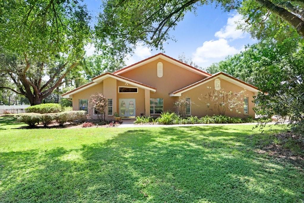 *NO HOA, POOL HOME, OVER AN ACRE!*Pre-Inspected & Move-In Ready with ALL Necessary Repairs Completed!*
Welcome to 13113 Lilita Ave in Dover, where comfort, charm, and convenience come together beautifully. This incredible home sits on just over an acre in a highly desired neighborhood, offering privacy, plenty of space, and thoughtful updates throughout. The tile roof has been professionally cleaned and maintained (2025), the exterior has a fresh coat of paint (2025), and stucco repairs have been completed for peace of mind. You’ll love the energy-efficient 2.5-ton geothermal heat pump (2020) with a 2021 return well.
*A Warm & Inviting Welcome* Step through the double front doors and be greeted by soaring ceilings, streams of natural light, and rustic wood beams that add instant character. Freshly painted neutral tones make the home feel bright, airy, and inviting the moment you walk in.
*Spacious Family Room & Dream Kitchen*
The family room is the heart of the home with its vaulted ceilings, custom built-in shelving, and charming wood-burning brick fireplace – the perfect spot for cozy evenings. Just steps away, the completely updated kitchen (2022) will delight any chef! Featuring gleaming quartz counters, soft-close solid wood cabinetry, updated lighting, and a full suite of newer appliances (fridge 2020, dishwasher 2023, range 2022, built-in oven & microwave 2018), this kitchen was designed for both function and beauty.
*Formal Living & Dining*
To the left of the entry, you’ll find spacious formal living and dining rooms. The front living area was professionally raised to create a seamless single-level floor plan, making the space perfect for entertaining. You’ll appreciate the newer tile floors that run throughout the home – no carpet anywhere – making cleaning a breeze.
*Practical Features & Updates*
Down the hallway is a well-appointed laundry room with washer/dryer (2016), utility sink, and direct access to the oversized 2-car garage. The garage boasts a brand-new Genie opener (2024) and updated electrical with breaker rewiring and a changeover switch (2021). Bonus – this home even comes with a generator!
*Bedrooms & Bathrooms*
Two generously sized bedrooms share a hall bath with updated vanity and mirror.
*Private Primary Suite*
The primary suite is a true retreat, featuring vaulted ceilings, French doors leading to the lanai, and a fully remodeled ensuite (2020 & 2023). Enjoy a spa-like experience with the freestanding tub, separate shower, dual vanities with granite counters, and elegant tile flooring.
*Outdoor Living*
Step outside to the oversized screened lanai and sparkling pool, complete with new pump (2022) and cleaner (2023). The fully fenced backyard is a dream – plenty of space to garden, play, or just relax while taking in peaceful views of cows grazing in the pasture behind. Two sheds provide plenty of storage for tools, toys, or hobbies.
Don't wait! This home won't last!