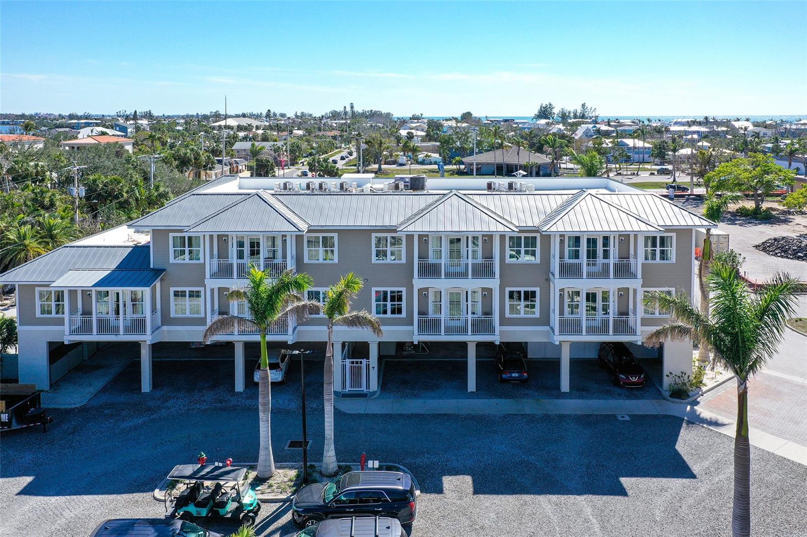 Another price reduction of $10,000. Owner says sell!!! Are you envisioning a hassle-free, income-generating property or a part-time getaway with rental income to help cover expenses? Discover Waterline Villas & Marina, where modern sophistication blends with the relaxed charm of Old Florida on Anna Maria Island. Built in 2017, each unit offers a stylish and comfortable retreat with 2 bedrooms, 2 full baths, a fully equipped kitchen, a cozy living area, and in-unit washer and dryer. Picture yourself waking up in a spacious primary bedroom with a king-size bed, or hosting guests in a second bedroom with two queen-sized beds and a pull-out sofa in the living room. Whether you're a guest or owner, you'll enjoy access to a range of resort-style amenities. Spend your days lounging by the pool, keeping fit in the gym, exploring the island on complimentary bicycles, or dining at the on-site restaurant. Watercraft rentals are readily available for water enthusiasts, and owners enjoy the luxury of complimentary 45’ boat slips, perfect for soaking in the captivating bay and sunset views. But that's not all—the condo fee takes care of all your utilities, covering water, electric, sewer, cable TV, and internet, making life at Waterline Villas & Marina as convenient as it is delightful. With on-site parking and a complimentary trolley service, exploring the island is a breeze. The zoning regulations allow you to occupy your unit for up to a total of 120 days annually, providing a flexible ownership experience. Whether you want to enjoy a serene getaway or benefit from a steady rental income, Waterline Villas & Marina offers the perfect blend of luxury, convenience, and Old Florida charm. Embrace this unique opportunity and let Waterline Villas & Marina be your ultimate island escape.
***Preferred Lender is offering 1% of the Loan Amount, as a Lender Credit toward Buyers Closing Costs or Interest Rate Buydowns on this specific Home.***