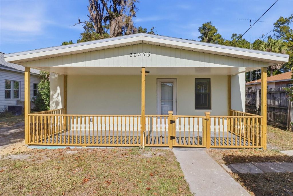 Photo of 20473 W Mckinney Avenue, Dunnellon, FL 34431 (MLS # OM715477)