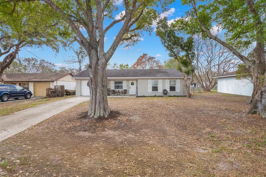 Under contract-accepting backup offers. No HOA | No CDD | Not in a Flood Zone | USDA, FHA & VA Financing Welcome. Move-in ready 3-bedroom, 1.5-bath home situated on just under a quarter-acre lot. Major updates completed in July 2018 include a new roof, HVAC system, hot water heater, and electrical panel. The interior features continuous flooring, a neutral color palette, and a bright, functional layout. The updated kitchen offers shaker-style cabinetry with crown molding and stainless steel appliances. The primary bedroom features an en-suite bathroom for added privacy. The secondary bedrooms are generously sized and conveniently located near the full bathroom. The garage features Alexa-compatible smart lighting, and the updated electrical panel includes a direct connection for generator hookup. The oversized backyard is fully fenced, offering plenty of space for outdoor activities, pets, or future additions. A storage shed is also included, providing convenient extra space for tools, lawn equipment, or seasonal items.  Located just minutes from I-4 and the Polk Parkway, this home offers convenient access to numerous shopping and dining options. Downtown Lakeland is less than 15 minutes away, where you can enjoy First Friday Foodie Fests, live music, and the beautiful Lake Mirror Park—recently voted one of the Top 10 Public Spaces in the U.S. Spend your time walking, jogging, or biking along the paved promenade, exploring the scenic Hollis Garden, visiting Barnett Family Park with its playground and splash pad, or attending the many events held throughout the year.