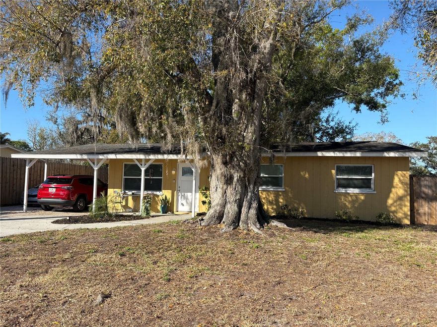 LAKE SARASOTA Nicely Updated 3-Bedroom,1-Bath + Carport  Double Driveway Could Park a Boat or RV as well!1!! The interior of this home has been updated Thru=Out. The floorplan is Very Open & Bright  Waterproof Vinyl Laminate Flooring Thru-out!, Newer Windows & Doors. The Kitchen features modern touches such as butcher block, custom backsplash, Newer Cabinets, and all  Stainless-Steel Appliances. The Bathroom is Bright, Spacious and Features a Beautiful Walk in Shower. Roof is Shingle 8 Years Old, Property is not in a Flood Zone Close to Lakeview Elementary School Rated #1, Dog  Paw Park Close by- Also a Place to take your Kayaks on the Lake next to Paw Park!! Shopping Right off Bee Ridge and Several Restaurants as well --I-75 Right Down the Bee Ridge road Easy to Get to the UTC Mall As well!!