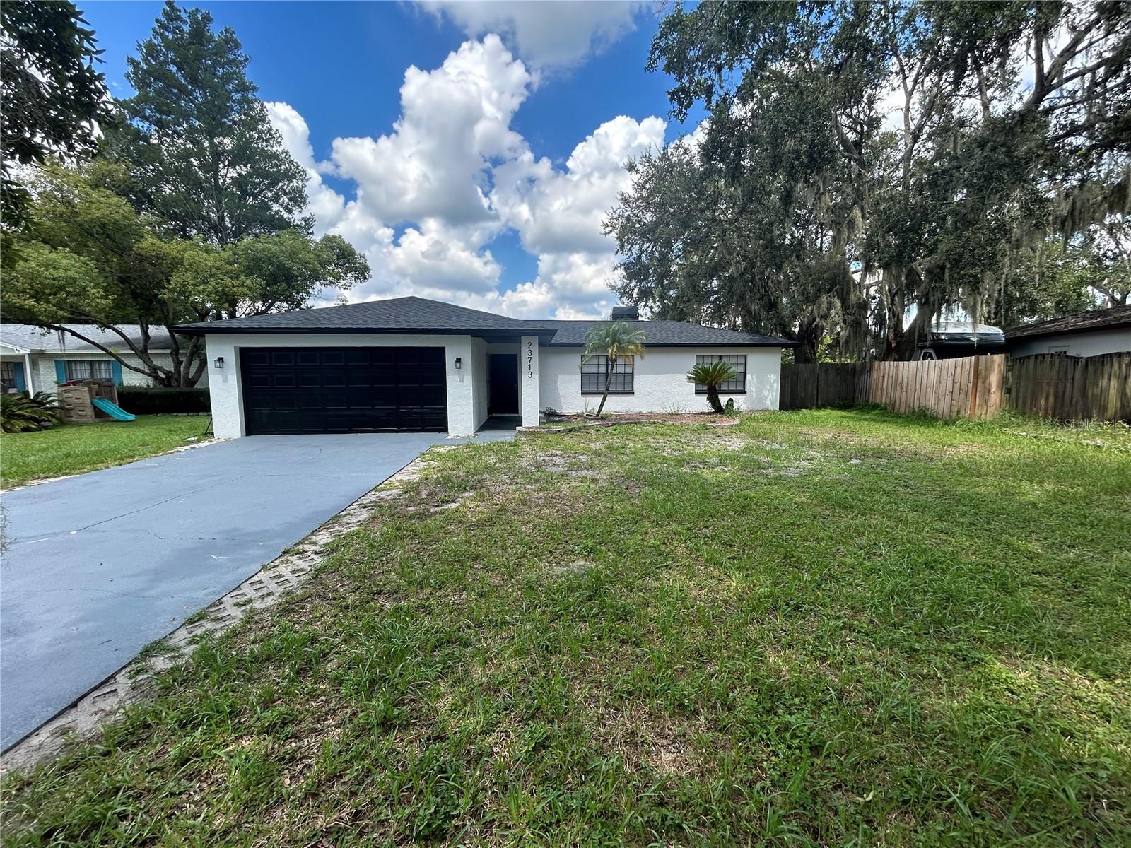 Welcome to your beautifully remodeled home in the heart of Lutz! This stunning property features brand-new flooring throughout, a fully renovated kitchen with modern cabinetry, countertops, and stainless steel appliances, as well as updated bathrooms with stylish finishes. Every detail has been thoughtfully updated to provide comfort, style, and functionality. This home offers both tranquility and convenience with easy access to shopping, dining, and major highways. Don’t miss your chance to own this move-in-ready gem!