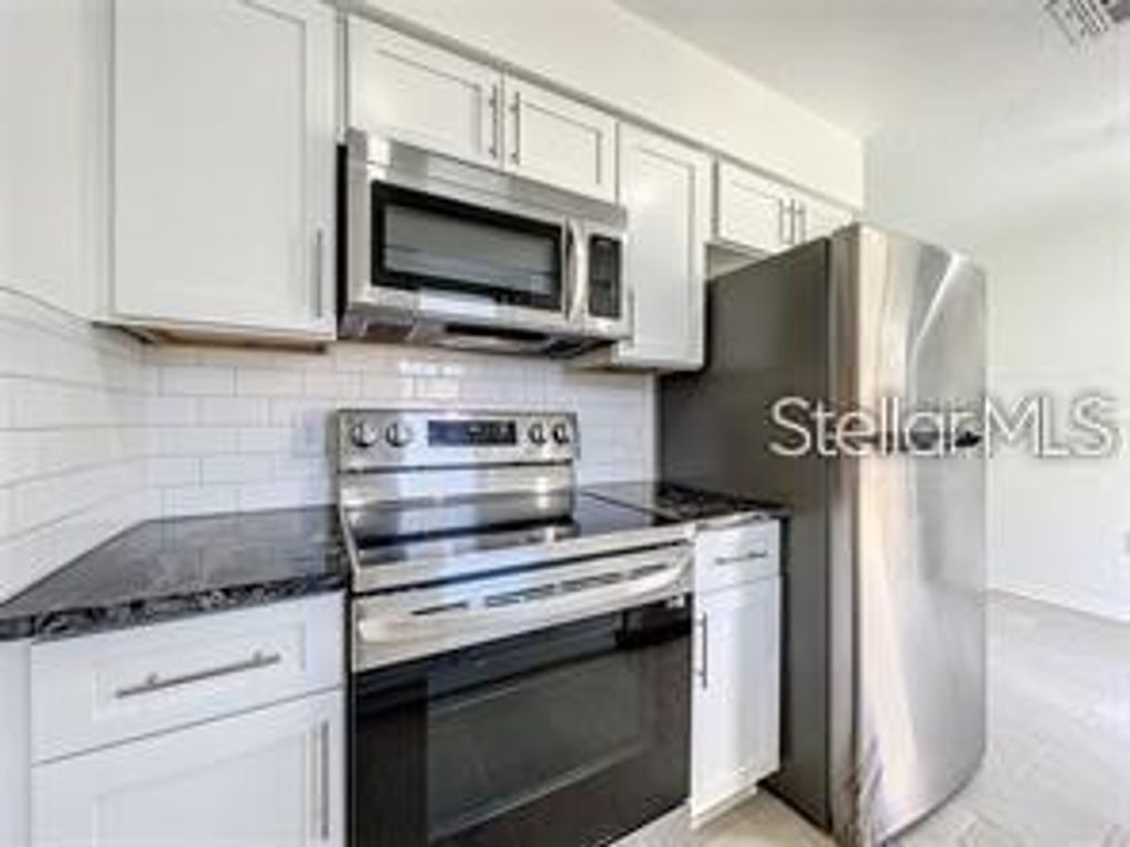Photo of 5024 W Washington Street, Orlando, FL 32811 (MLS # S5148086)