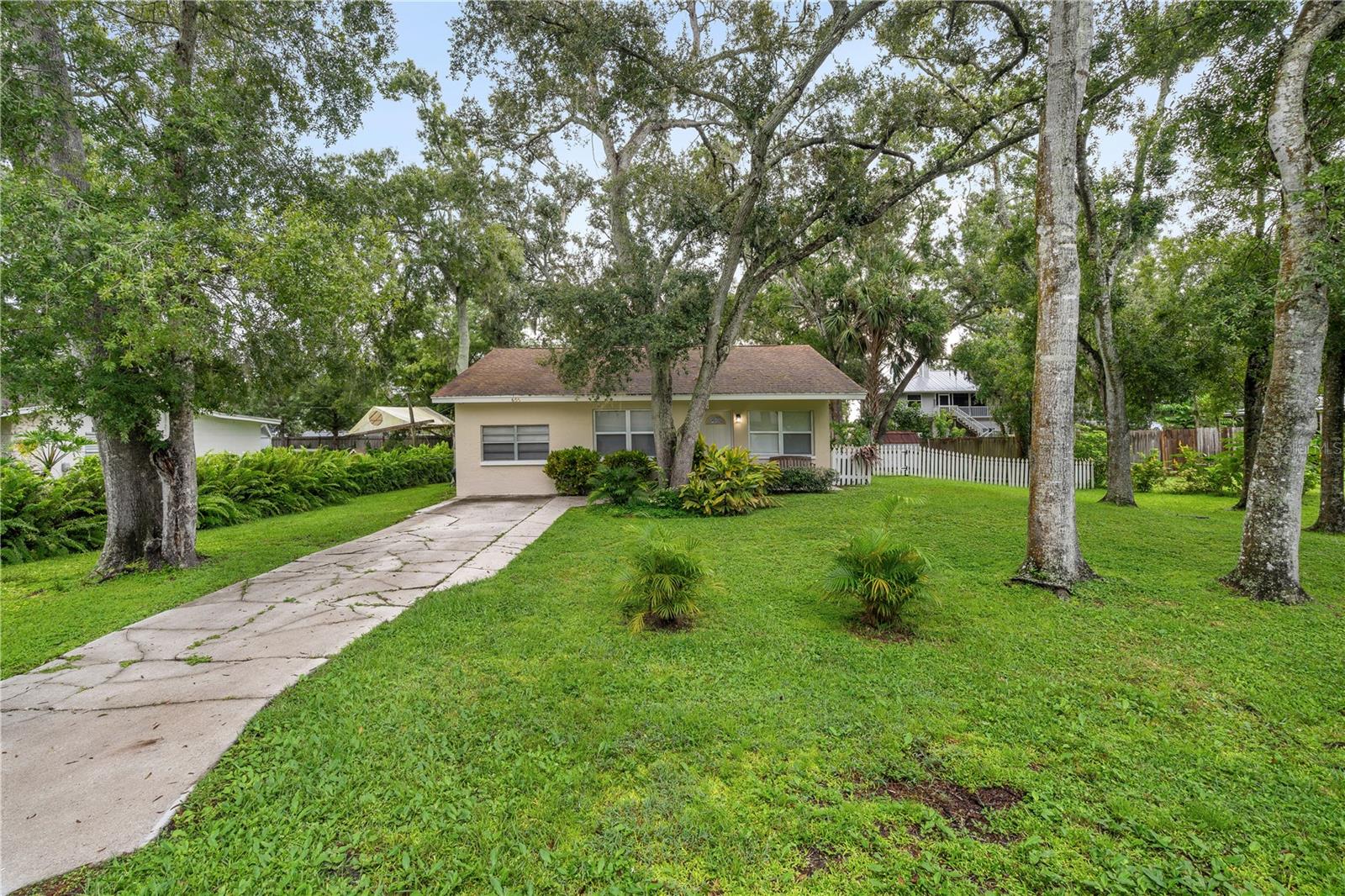 Charming and move-in ready! This adorable home sits on a spacious 1/4 acre lot in a wonderful family-friendly location. Concrete Block home on just about a 1/4 acre with a new AC in 2024, Roof 2018, new septic tank distribution box and high pressure jetting of drainfield 2023. No water or sewer bills here! Experience pride of ownership in this beautifully cared-for home with 2 bedrooms, 1 bath, a large bonus room perfect as an office, a second living room or a 3rd bedroom. This home is move-in ready with ceramic tile and luxury vinyl flooring, inside laundry room and a back screened porch. Endless possibilities on this lot with no HOA and friendly neighbors. The large yard offers plenty of space for outdoor living, gardening, or play. Perfect for first-time buyers, downsizing, or investment—don’t miss this opportunity to own a delightful home in a great community! Great location near Detwiler's, Publix, Target, dining, and more! Easy access to I-75, UTC shopping and Celery Fields to name just a few. Live comfortably in Sarasota while enjoying the outdoor lifestyle on Siesta Beach, Nathan Benderson Park, Sarasota Bayfront, The Legacy Trail and our many state parks. Furniture and furnishings can be sold on a separate bill of sale. This one is a must see!