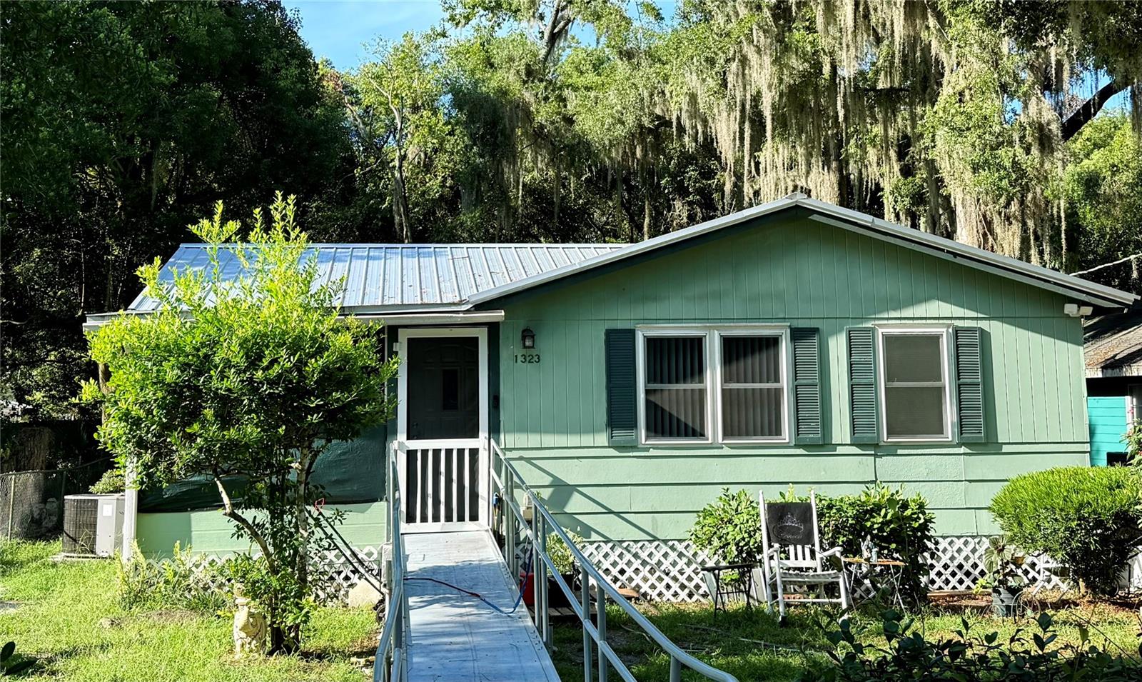 Whether you're searching for a place to call home or a smart investment opportunity, this 3-bedroom, 1-bath residence is full of potential. With 888 square feet of comfortable living space, it offers both convenience and an unbeatable location. Recent updates include a new roof in 2023 and newer windows, offering added peace of mind and improved energy efficiency. Just minutes from downtown Gainesville and moments from the University of Florida, you'll enjoy easy access to parks, dining, shopping, and more. This centrally located gem is a fantastic opportunity for homeowners or investors alike