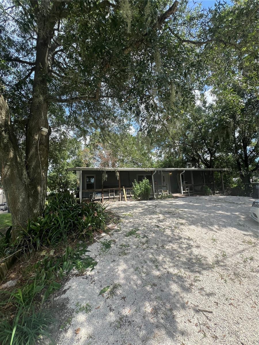Waterfront living at an affordable price — and no HOA! This fully remodeled 3-bedroom, 2-bath 1990 mobile home offers direct canal access to Lake Lowery from the front yard, perfect for fishing or kayaking. The split floor plan features an open kitchen, spacious living areas, and a private primary suite. Enjoy a large lot with room for outdoor activities. Major updates include a brand-new roof (June 2025). Conveniently located near shopping, dining, schools, and major highways. Ideal as a starter home, vacation retreat, or investment property.