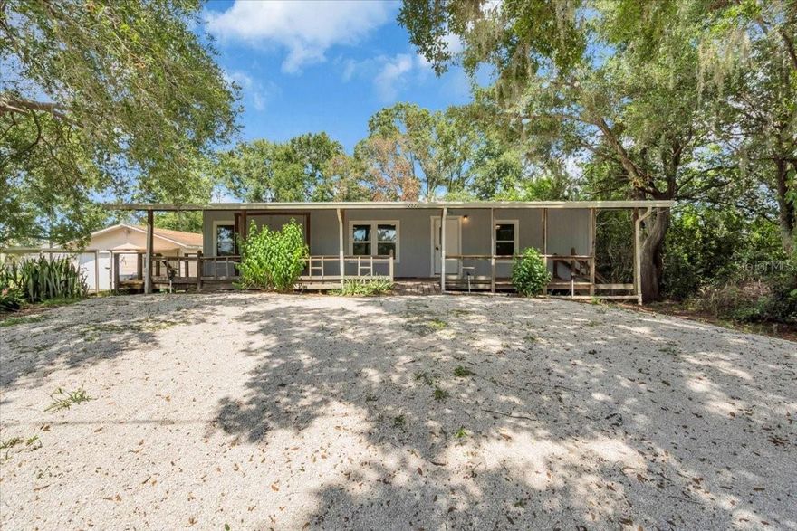 Waterfront living at an affordable price — and no HOA! This fully remodeled 3-bedroom, 2-bath 1990 mobile home offers direct canal access to Lake Lowery from the front yard, perfect for fishing or kayaking. The split floor plan features an open kitchen, spacious living areas, and a private primary suite. Enjoy a large lot with room for outdoor activities. Major updates include a brand-new roof (June 2025). Conveniently located near shopping, dining, schools, and major highways. Ideal as a starter home, vacation retreat, or investment property.