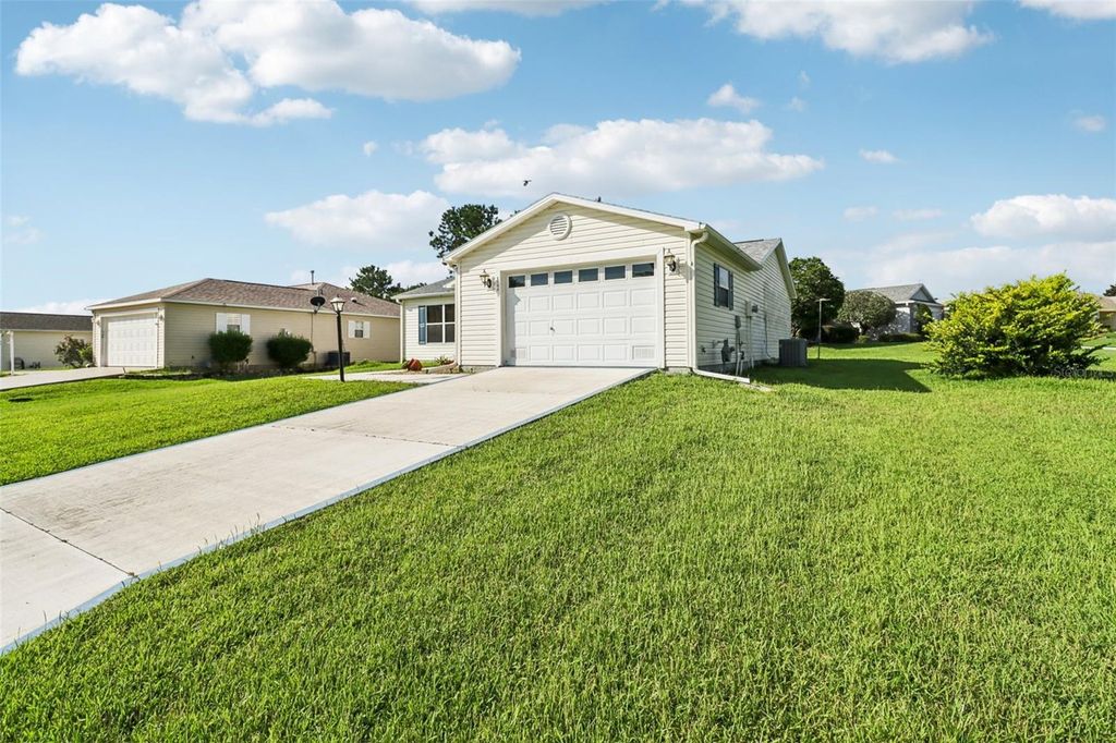 Photo of 8544 SE 177th Bartram Loop, The Villages, FL 32162 (MLS # OM705783)