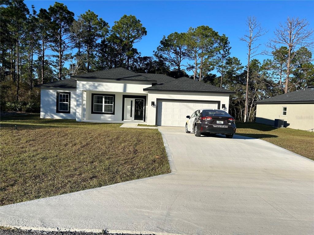 Photo of 2097 W Hampshire Boulevard, Citrus Springs, FL 34434 (MLS # O6368295)