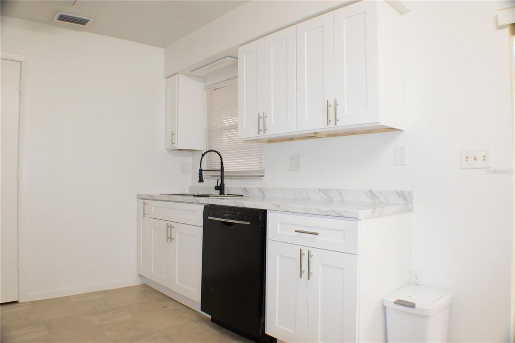 Photo of 424 Cart Court, Poinciana, FL 34759 (MLS # S5148423)
