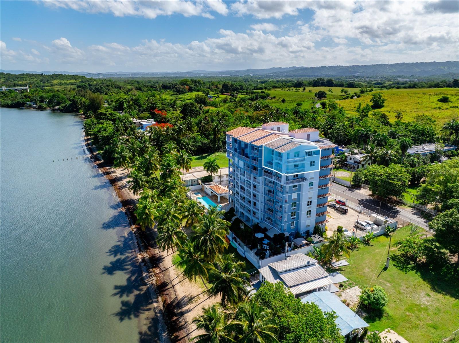 Experience coastal living in this stunning corner penthouse at Torre Marsella in Cabo Rojo, offering breathtaking ocean views and direct beach access. This spacious two-level residence features 3 bedrooms, each with its own ensuite bath, plus a full guest bathroom and a half bath conveniently located in the garage. The master suite features two private balconies, while the spacious living area is bathed in natural light with floor-to-ceiling windows and private elevator access from your garage to your living room. Enjoy a modern open, in-unit laundry, and two private garages. Located in a residential-only beachfront community where short-term rentals are not permitted, this is the perfect retreat for refined coastal living.