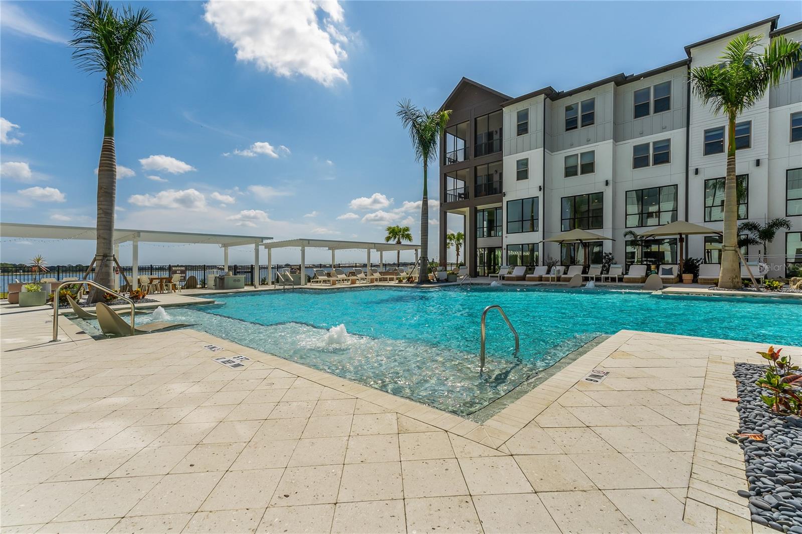 The Row Waterside in Lakewood Ranch is a rental community located in Sarasota County. These spacious studio, one, two and three bedroom apartments and two and three bedroom townhouses, are full of the modern conveniences and amenities that you would want in your rental. Every unit in this community offers beautifully done finishes with open concept layouts, contemporary lighting fixtures, custom cabinetry, gourmet kitchens with executive chef undermount sinks, energy efficient and stainless appliances and full-sized washer and dryers. The townhouses have their own attached 2-car garages. These are just a few of the many features you will have in your apartment or townhouse. The Row Waterside also allows up to two pets per apartment. You will have full access to all the amenities this community has to offer, a resort-inspired swimming pool, full-size grilling options with lounging areas by the pool, poolside gaming area with cornhole, state-of-the-art fitness center, movie theater, cyber café, pet spa, gourmet coffee bar, private conference rooms, the amenities list is endless at The Row. Located within walking distance of Main Street in Waterside, you will find endless shopping, restaurants, and entertainment. (Minimum 7-month leases are available (Pricing varies on shorter terms). Up to 6 WEEKS FREE on select units AND $99 "Look and Lease" with reduced admin and application fee at move in!!!
