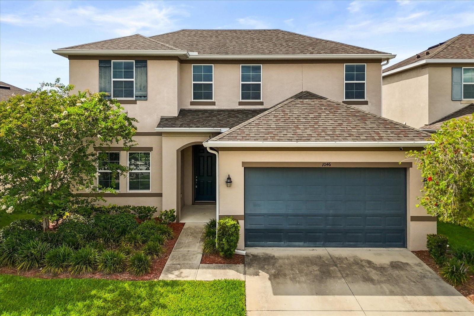 Now available for rent! This stunning 5-bedroom, 3-bathroom home, built in 2018 by K. Hovnanian, is located in the desirable Hilltop Reserve community in West Apopka—just minutes from FL-414 and FL-429 for easy commuting.
Step inside to find a versatile downstairs bedroom and full bath—ideal for guests, a home office, or multi-generational living. The spacious living and dining area features soaring ceilings and 18” tile floors throughout. The heart of the home is the luxurious gourmet kitchen, complete with a large island, granite countertops, ceramic tile backsplash, stainless steel appliances, gas range, and 42" cabinets.
Enjoy your evenings on the fully screened-in lanai overlooking a private, fenced-in backyard with no rear neighbors. The main floor also boasts a spacious primary suite with a custom walk-in closet and private access to the laundry room. The en-suite bathroom includes a double vanity and a glass-enclosed shower.
Upstairs, you’ll find a generous loft/flex space, three additional bedrooms, and the third full bathroom. With ample storage, modern finishes, and a thoughtful layout, this home has it all.
Residents also enjoy access to resort-style amenities, including a cabana, community pool, and playground.
Don’t miss your chance to call this beautiful house your next home—schedule a showing today!