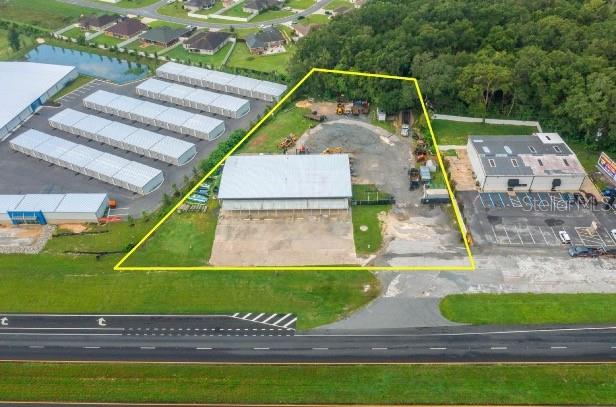 Exceptional opportunity for an end user or investor—this 1.35-acre commercial property features B5 zoning and outstanding visibility along busy Hwy 441 (AADT, 29,500). The 7,200 SF warehouse includes approximately 2,000 SF of professionally finished office space, making it ideal for a variety of business uses.