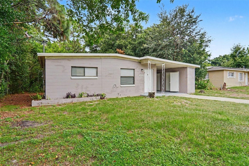 Photo of 4720 Balboa Drive, Orlando, FL 32808 (MLS # O6428332)