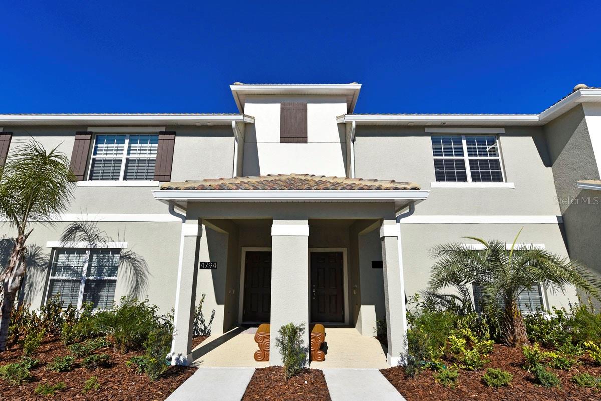 Live in comfort and style in this fully furnished 4-bedroom, 3-bathroom townhome in the exclusive guard gated Storey Lake Resort — ideally located in Kissimmee, just minutes from Disney, Universal, SeaWorld, premium outlets, Lake Buena Vista, and a wide variety of dining and entertainment. The modern layout features a gourmet kitchen with stainless steel appliances, granite countertops, and 42" cabinets, opening to the living and dining area. Outside, enjoy a private splash pool with peaceful lake views. For added convenience, one bedroom is located downstairs, with three more upstairs. Resort amenities include a clubhouse with tiki bar, resort-style pool and lazy river, water slides, splash park, mini-golf, kayaking, sand volleyball, and a full fitness center. Available for immediate occupancy. Annual lease only. No pets allowed.