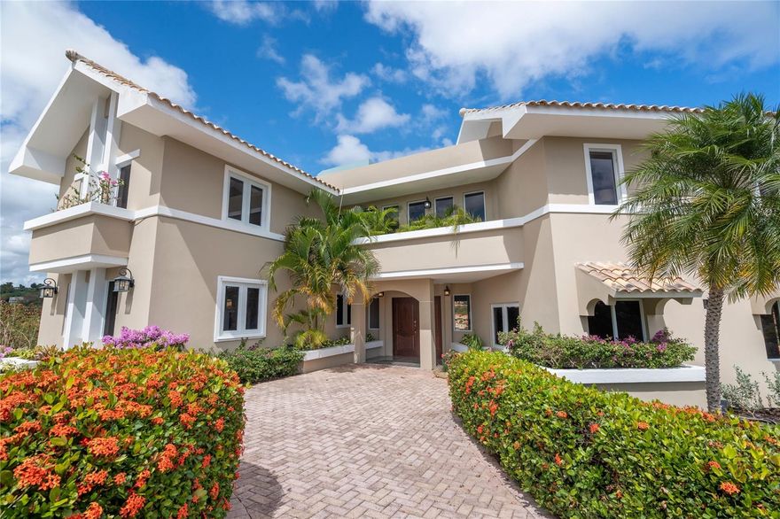 Located in Palmas del Mar, this three-story home with a pool and panoramic views of Palmas del Mar and Vieques has 4,000 square feet. The cross ventilated 4 bedrooms and 3.5 bathrooms property is fully furnished and offers a master bathroom with designer tub, 6 a/c inverters units, two car garage, covered and uncovered terraces, high efficiency appliances and Spanish tiles roof. The kitchen was renovated in 2018, while the windows and doors got updated in 2023. HOA Harbour Lights $300.00 per year. HOA Palmas del Mar $992.00 per year. Gated community with security and community surveillance system.