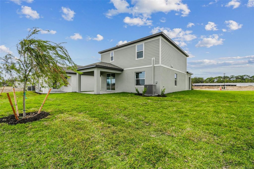 Photo of 9106 Optimist Way, Palmetto, FL 34221 (MLS # R4910617)