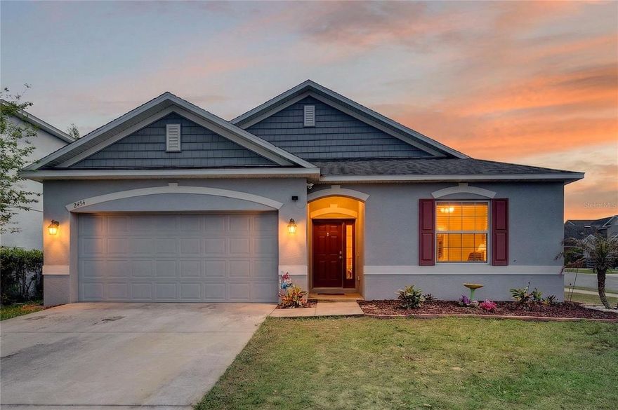 Welcome to the Martins Grove Community- 2452 Norwood Place Tavares, Florida—“America’s Seaplane City”! This inviting 3-bedroom, 2-bath home with low HOA is ideally located just minutes from the Tavares vibrant downtown area, where you can enjoy waterfront dining, local shops, and year-round events.

Thoughtfully upgraded and designed for modern living, this home features an open floor plan filled with natural light and enhanced by elegant crown molding. The spacious layout is perfect for both everyday comfort and entertaining guests.

The kitchen offers ample cabinets, Kitchen Island and tons of counter space, seamlessly flowing into the main living areas. A standout feature of this home is the builder’s extension—an additional two feet added across the entire back of the home—creating a noticeably larger and more comfortable primary suite.

Additional upgrades include a water softener system and a newly installed fence, adding both convenience and privacy.

With three generously sized bedrooms and two full bathrooms, this home provides flexibility for families, guests, or multi-generational living.

Enjoy the Florida lifestyle outdoors with space to relax or entertain, all while being just moments from the charm and activity of downtown Tavares.

This beautifully upgraded home is a must-see—schedule your private showing today!