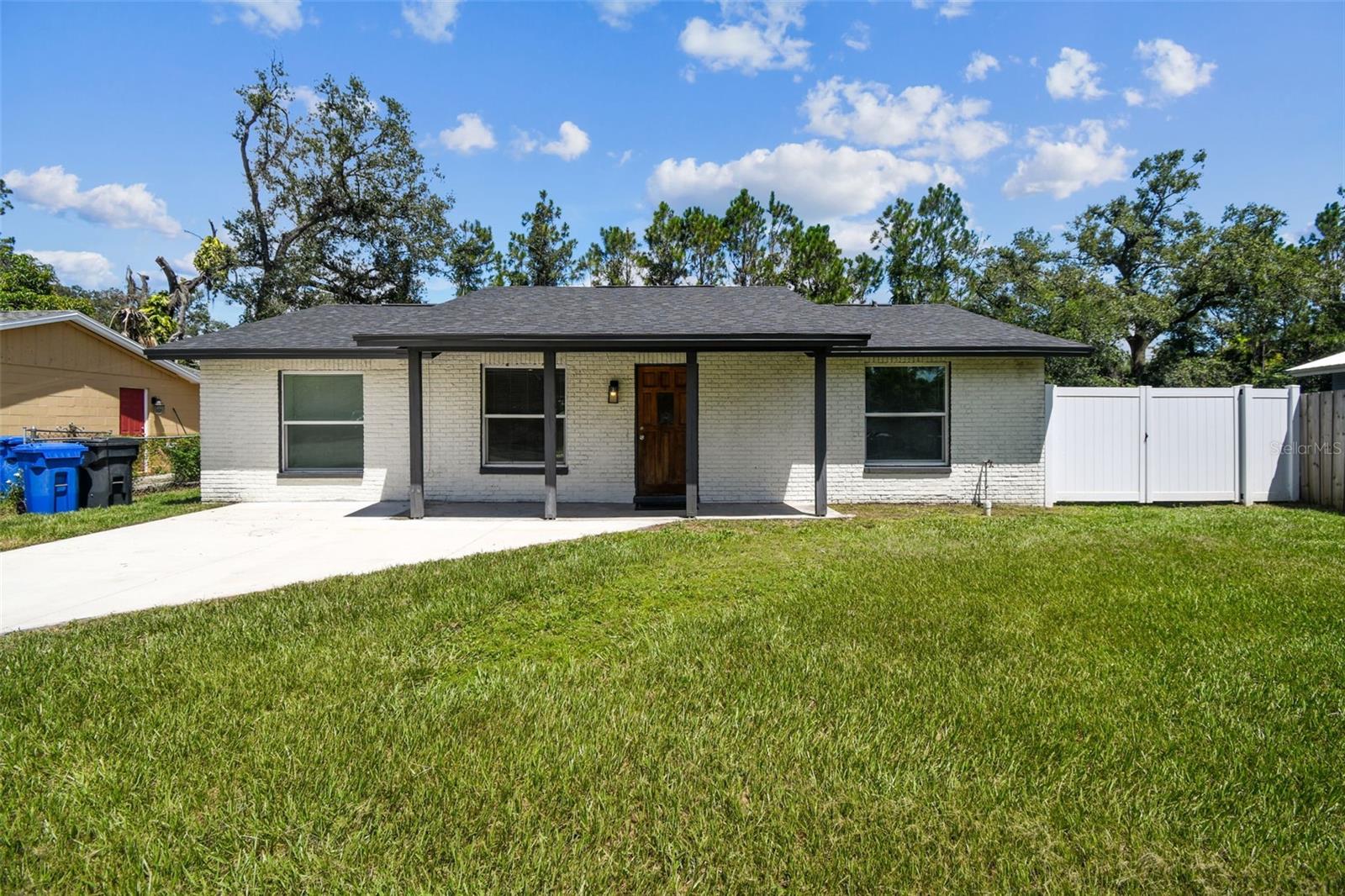 Welcome to 3503 Acorn St, Tampa, FL 33619 — a beautifully renovated 3-bedroom, 2-bathroom home with 1,223 sq. ft. of living space in the East Lake-Orient Park area. This move-in ready property showcases contemporary wood-look tile floors throughout, fresh interior and exterior paint, and a modern kitchen with quartz countertops and solid wood cabinets. Both bathrooms have been thoughtfully updated for a clean, contemporary style. Outside, a detached shed offers potential for an in-law suite, home office, or workshop. Enjoy a spacious yard and a rear patio, perfect for relaxing or entertaining. Priced at $334,900, this home blends comfort, style, and value in a convenient Tampa location.