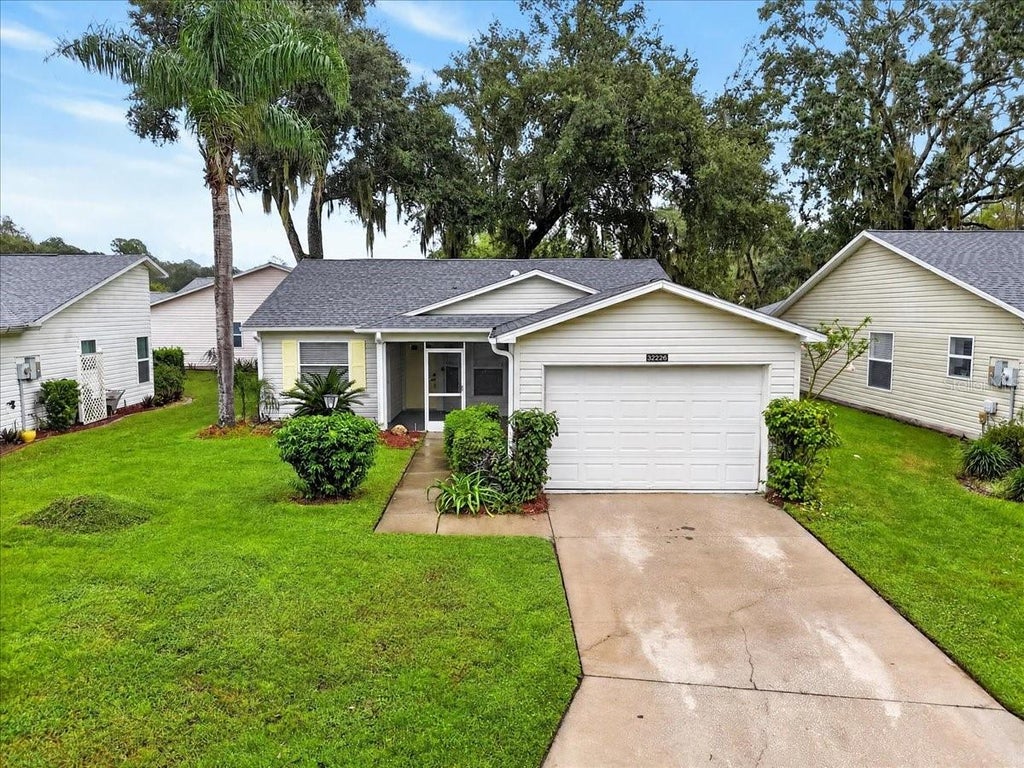Photo of 32226 Summertree Circle, Leesburg, FL 34748 (MLS # TB8557760)