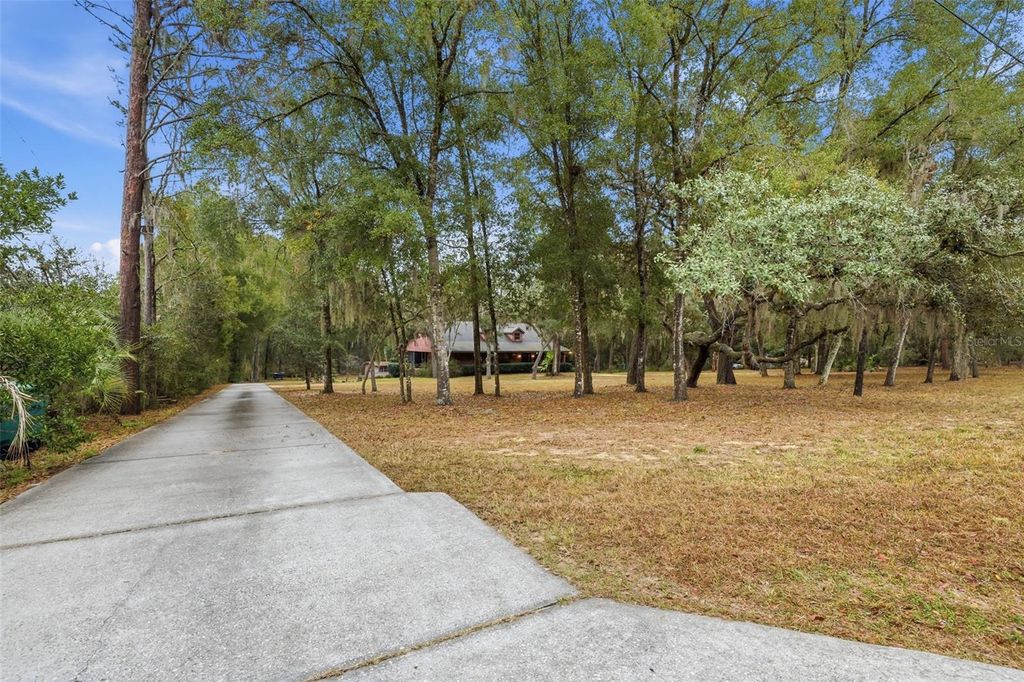 Photo of 5031 N Highland Park Drive, Hernando, FL 34442 (MLS # OM716458)