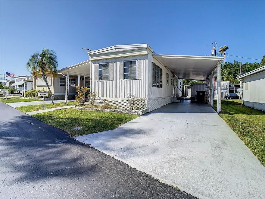 Move in ready and well maintained 2 bedroom 1 bath home in the 55+ mobile home community of Tropical Gardens. Features include a living and dining room combo towards the front of the home with two bedrooms and 1 bath at the rear. There is an enclosed porch / Florida room located off the south side of the home with a 2 car covered carport on the North side. There are two sheds included perfect for storage. This home is offered furnished or unfurnished. Location is convenient to I275, shops, restaurants, and all the beautiful Gulf Beaches. This is an excellent opportunity to make this your home.